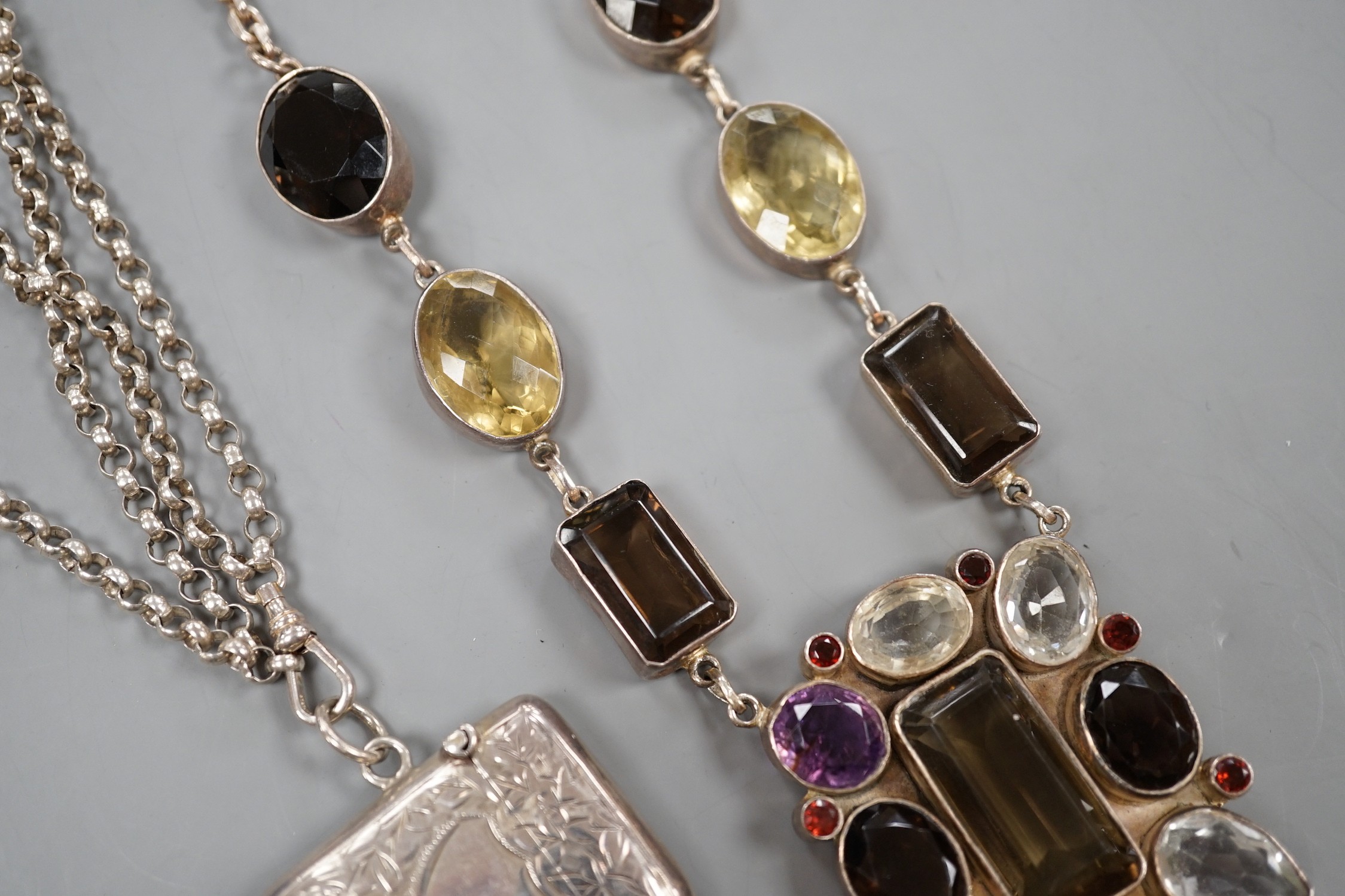 A large continental 925 white metal and multi-gem set rectangular pendant necklace, overall 72cm and a white metal double strand chain hung with a silver vesta case.